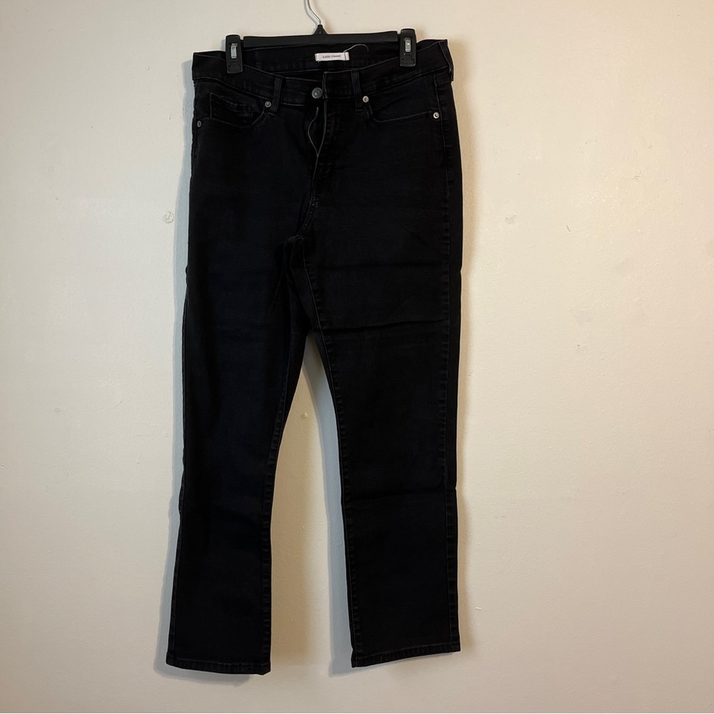 Women’s classic straight size 12 black Levi jeans